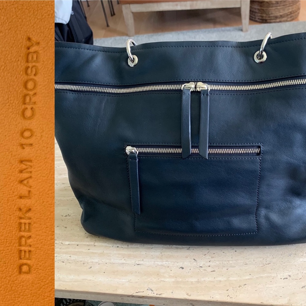 Derek Lam 10 Crosby Navy Leather bag. Bright orange leather inside. New